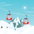 Cable cars or aerial lift moving above the ground against winter