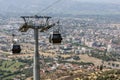 Cable cars ferry tourists at Bergama in Turkey. Royalty Free Stock Photo