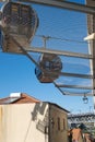 Cable cars floating over metal security web in Gaia, Porto Royalty Free Stock Photo