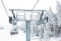 Cable cars just above the ski track Royalty Free Stock Photo