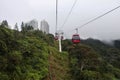 Cable cars traveling in the mist at Genting Highlands, Malaysia