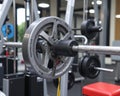A cable crossover machine with adjustable pulleys, steel weight stacks, and a rubber grip handle Royalty Free Stock Photo