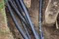 The cable is laid in the ground. Laying the electrical cable in the ground. City communications. Royalty Free Stock Photo