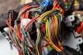 A cable of matted wires of different colors with connectors in the electrical wiring of the car. Internet line in the work of the