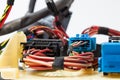 A cable of matted wires of different colors with connectors in the electrical wiring of the car. Internet line in the work of the Royalty Free Stock Photo