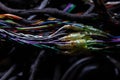 A cable of matted wires of different colors with connectors in the electrical wiring of the car. Internet line in the work of the Royalty Free Stock Photo