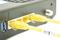 Cable modem router with yellow lan Royalty Free Stock Photo