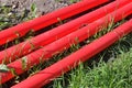 Cable protective pipe lying on the ground Royalty Free Stock Photo