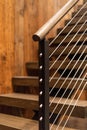 Cable Stair Railing Detail with Wood Treads Royalty Free Stock Photo