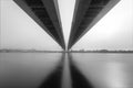 Cable-stayed bridge over river in fog. black and whito photo. bw bridge Royalty Free Stock Photo