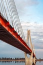 Cable-stayed bridge at sunset against a beautiful sky. Royalty Free Stock Photo