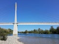 cable-stayed cycle-pedestrian bridge over the Serchio river in Lucca taken from a shore Royalty Free Stock Photo