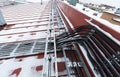 Cable tray outside with telecommunications cables, ground cables, optic fiber, power cables and transmitter data cables Royalty Free Stock Photo