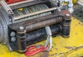 cable winch mounted on a yellow sheet