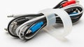 Cables include USB and audio jacks in colors like black white and Royalty Free Stock Photo