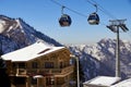 cableway cabin above the wooden chalet in a ski resort