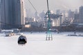 Cableway lift across the Songhua River in winter, skyline of Songhuajiang river in Harbin