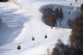 Cableway lift cabins on snowy ski slope background beautiful winter scenery