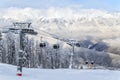 Cableway ski lift cabins on snowy mountain background beautiful winter scenery