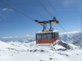 Cableway for the transport of tourists at high altitude on the immaculate snow