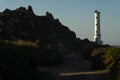 Cabo (cape) Home lighthouse on the cliffs at sunset in Rias Baixas zone in Galicia coast