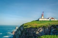 Cabo da Roca, Portugal. Lighthouse and cliffs over Atlantic Ocean, the most westerly point of the European mainland. Royalty Free Stock Photo