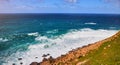 Cabo da Roca, Portugal. Lighthouse and cliffs over Atlantic Ocean, the most westerly point of the European mainland Royalty Free Stock Photo