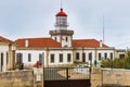 Cabo Mondego lighthouse facing the ocean, Figueira da Foz, Portugal Royalty Free Stock Photo