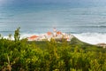 Cabo Mondego lighthouse facing the ocean, Figueira da Foz, Portugal Royalty Free Stock Photo