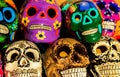 Calacas wooden skull Day of the Dead masks on market in Cabo San Lucas Mexico