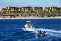 Cabo San Lucas, Mexico - November 7, 2022 - Boats moving on the ocean overlooking the resort hotels