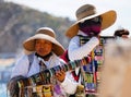 Cabo San Lucas, Mexico - November 7, 2022 - A local salesperson offering colorful jeweleries for sale on a sunny day