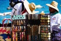 Cabo San Lucas, Mexico - November 7, 2022 - The local salesperson offering colorful souvenirs and dog collars for sale on a sunny