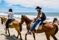 Young man horseback riding on the beach in Cabo san Lucas, Baja California Royalty Free Stock Photo