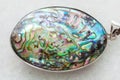 cabochon from Abalone (haliotis) shell on white Royalty Free Stock Photo