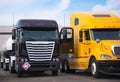 Different models of trucks are standing next to each other in pa Royalty Free Stock Photo