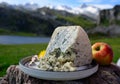 Cabrales artisan blue cheese made by rural dairy farmers in Asturias, Spaom cowÃ¢â¬â¢s milk or blended with goat, sheep milk