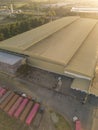 Cabuyao, Laguna, Philippines - Aerial of a large warehouse with many Semi-trailer trucks parked near the building. Royalty Free Stock Photo