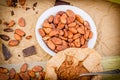 Cacao beans, cocoa powder and black chocolate on table Royalty Free Stock Photo