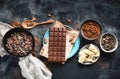 Cacao beans, powder, cacao butter  and chocolate bar Royalty Free Stock Photo