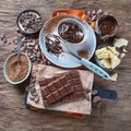 Cacao beans, powder, cacao butter,  chocolate bar and chocolate sauce Royalty Free Stock Photo