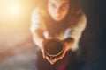 Cacao ceremony, heart opening medicine. Ceremony space. Cacao cup in woman& x27;s hand. Royalty Free Stock Photo