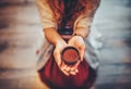 Cacao ceremony, heart opening medicine. Ceremony space. Cacao cup in woman& x27;s hand. Royalty Free Stock Photo