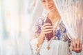 Cacao ceremony, heart opening medicine. Shaman ceremony space. Woman with a cocoa bean in her hand.