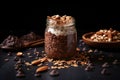 cacao nibs and oats in a jar, shot on a black slate