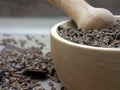 Cacao nibs raw crushed beans in pestle Royalty Free Stock Photo