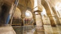 Caceres arab cistern with blurred tourists