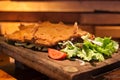 Cachopo, a typical dish of the Asturias region of Spain that consists of two large breaded veal fillets filled with ham and cheese Royalty Free Stock Photo