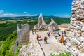 Cachtice, Slovakia - 4.7.2020: Tourists are visiting ruin of medieval castle Cachtice. Famous castle known from legend about blood
