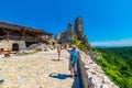 Cachtice, Slovakia - 4.7.2020: Tourists are visiting ruin of medieval castle Cachtice. Famous castle known from legend about blood